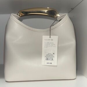 Elegant Cream Handbag with Gold Handle